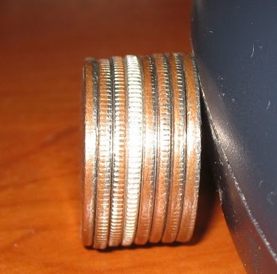 How to tell if I have a 1965 90% silver quarter because compared to another it looks like half ...